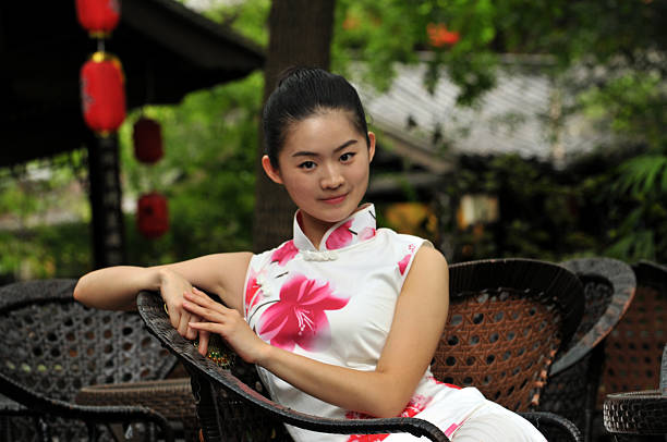 Chinese girl is sitting in chair