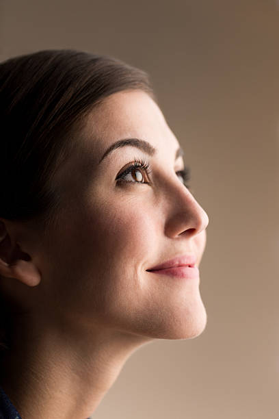 istock Young latin woman looking up 509417391