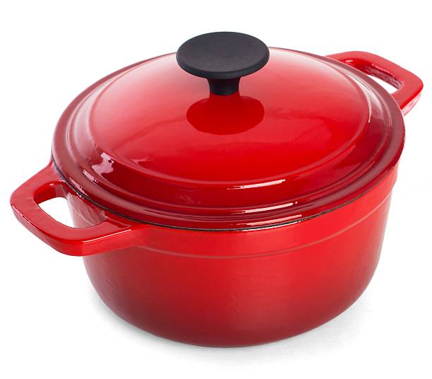 istock Red cast iron cooking pot with black handle/isolated on white 509417500