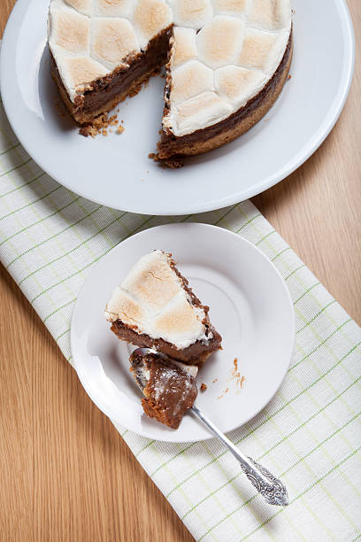 istock Sweet cake with chocolate on a light wooden table 509418160