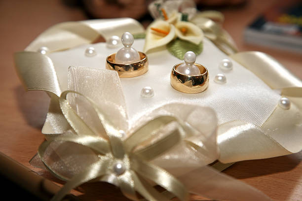 istock gold wedding rings lie on a decorative pillow 509418174
