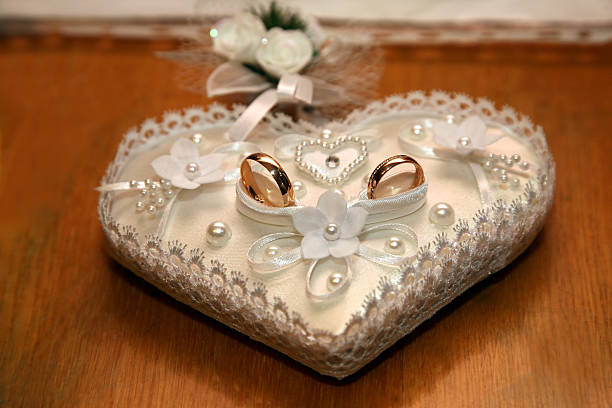 istock gold wedding rings lie on a decorative pillow 509418490