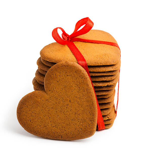 istock Heart shaped sugarcookie tied with red ribbon 509418649