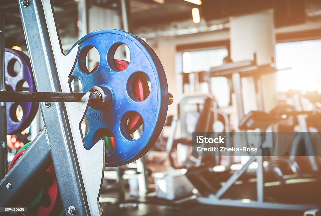 Rod with weights Rod with weights in the gym Backgrounds Stock Photo