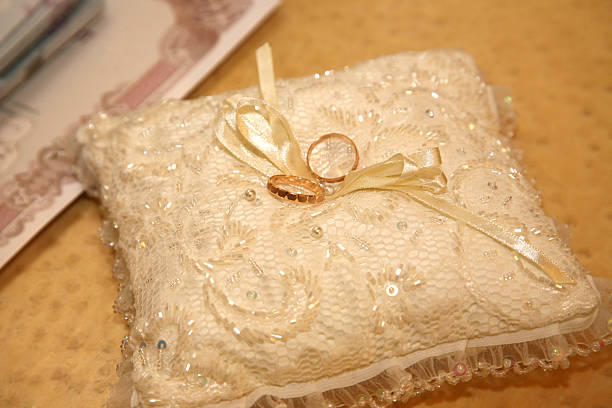 istock gold rings for wedding are on decorative pillow 509421328