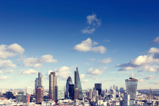 London skyline with the landmark corporate buildings of the City of London and Canary Wharf.