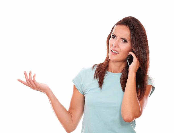 istock Angry hispanic woman speaking on her phone 509422597