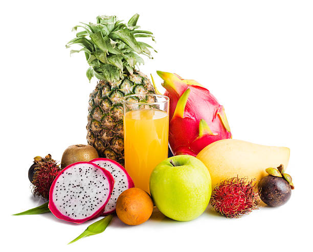istock juice in glass and tropical fruit 509423515
