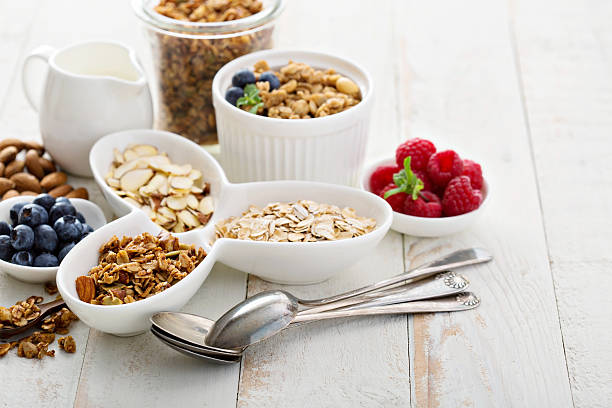 Breakfast items on the table Breakfast items on the table granola and oats dietary fiber photos stock pictures, royalty-free photos & images