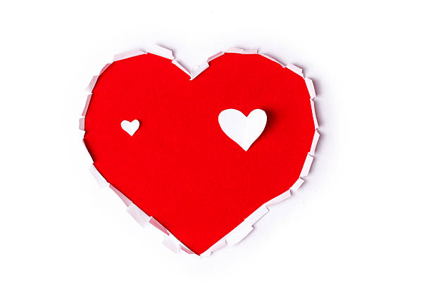 istock Heart shape Hole In the paper 509429292