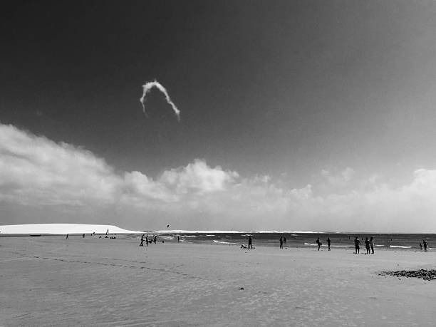 Black & white photo of kitesurfing on Lake Champlain