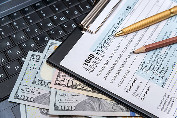 istock tax form 1040 with laptop 509435302