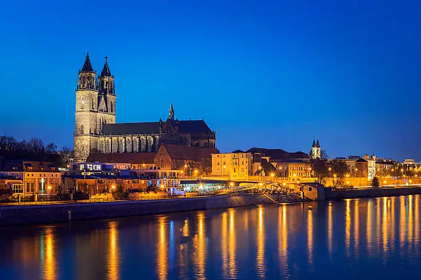 Night scene city Magdeburg with river Elbe in Saxony Anhalt Germany