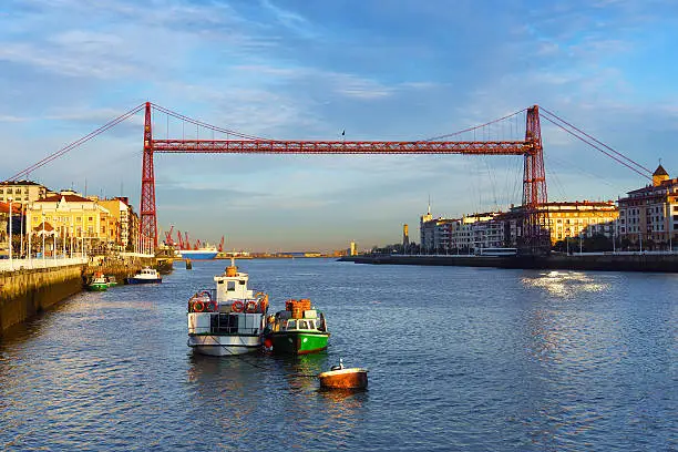 Portugalete and Las Arenas of Getxo with hanging bridge at sunrise