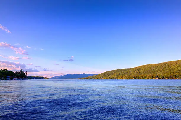 Photo of Lake George lit by evening sun, NY.