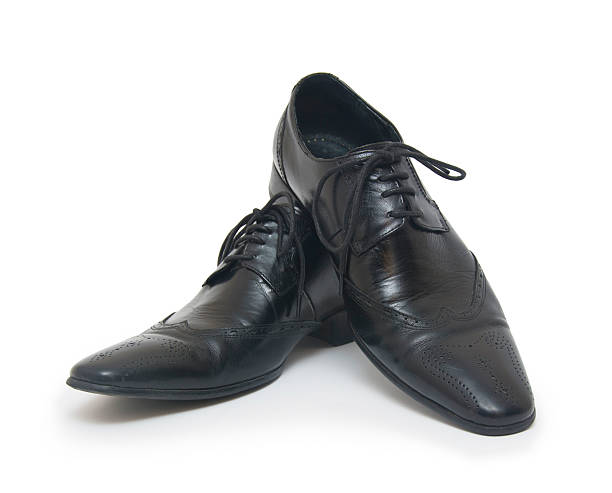 istock The black man's shoes isolated on white background. 509447941