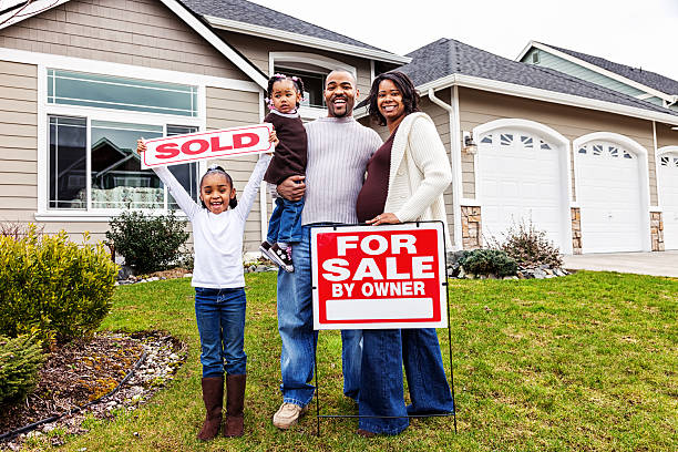 istock Family with Sold Home 509463801