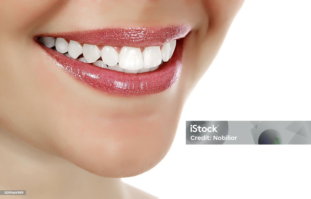 Woman smiling Woman smiling, white background, copyspace Smiling Stock Photo