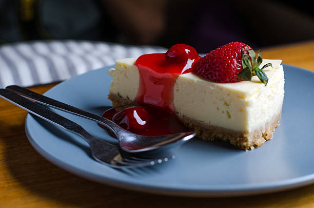 istock Strawberry Cheesecake with spoon and fork 509465477
