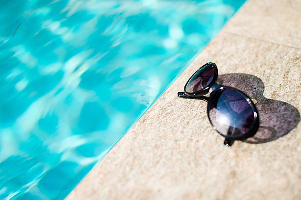 istock Sunglasses near swimming pool 509467191