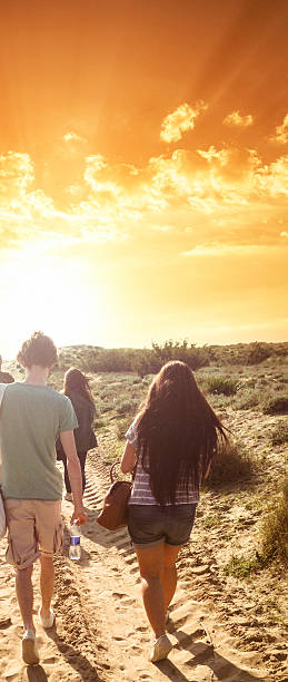 istock friends walking at summer to the beach 509469676
