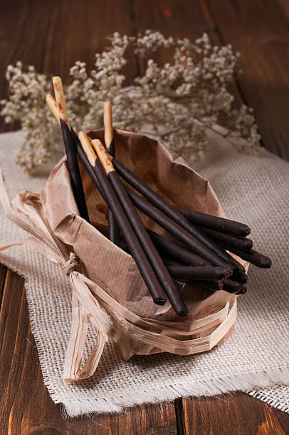 istock chocolate sticks in a paper bag on napkin 509470956