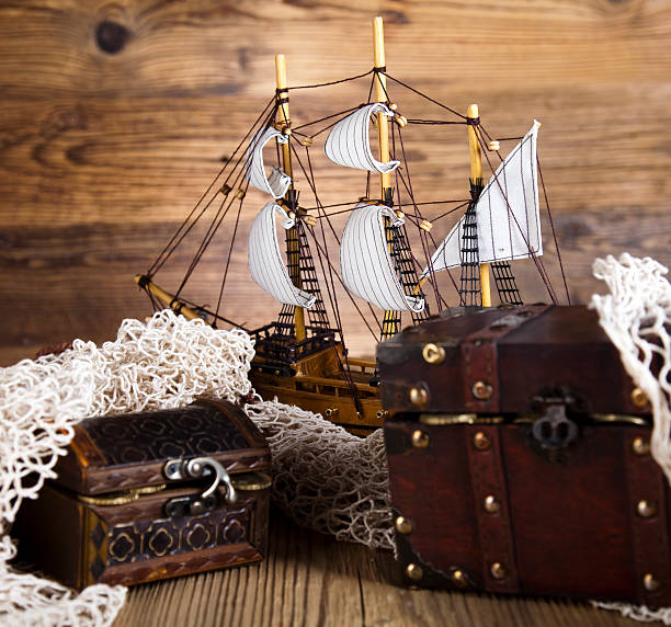 istock pirate ship, chest of gold, net 509470977