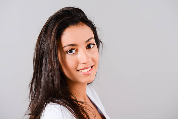 istock isolated studio shot of beautiful and cheerful young brunette 509471561