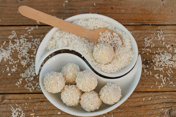 istock Making truffles white chocolate with coconut. Homemade candy 509471726