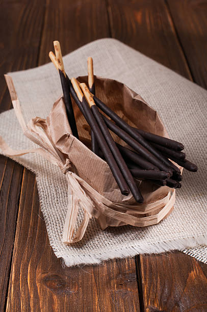 istock chocolate sticks on linen napkin 509472320