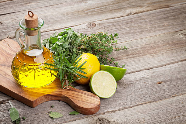 istock Olive oil and fresh garden herbs 509473966