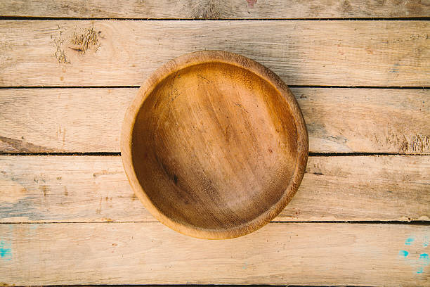 istock wooden bowls on wood background 509474890