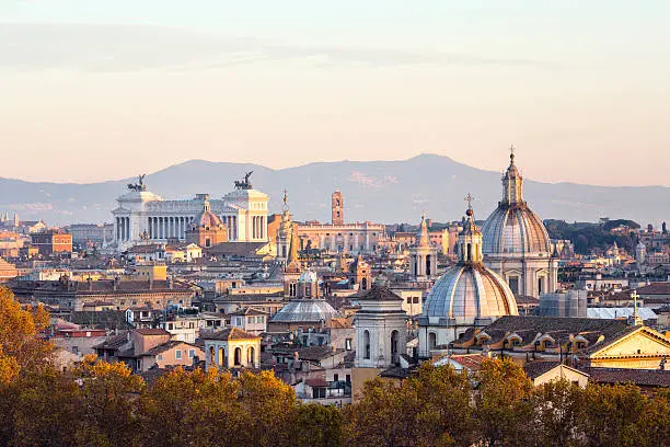 Photo of Roman citscape panorama at sunset, Rome Italy