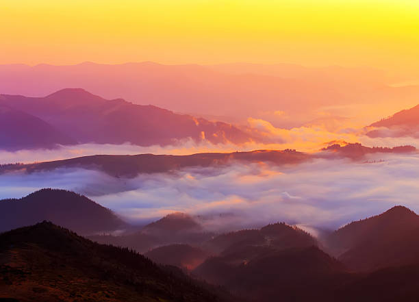 istock Summer sunrise in mountains. 509476158