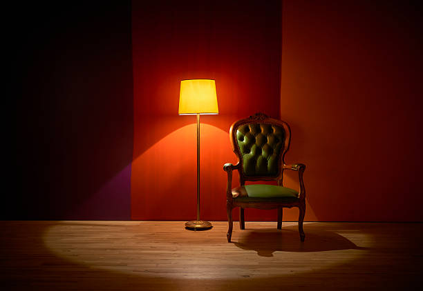 istock Solitude electric lamp in room with red wall 509478336