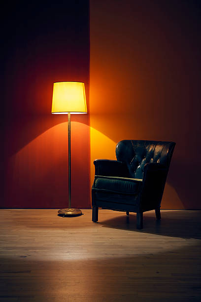 istock Solitude electric lamp in room with red wall 509478702