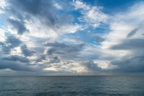 Dramatic sky background Dramatic cloudscape over the sea, Antalya, Turkey cirrus storm cloud cumulus cloud stratus stock pictures, royalty-free photos & images
