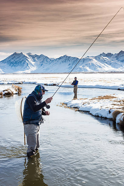 istock Two Fly Fisherman In The River During Winter 509481204