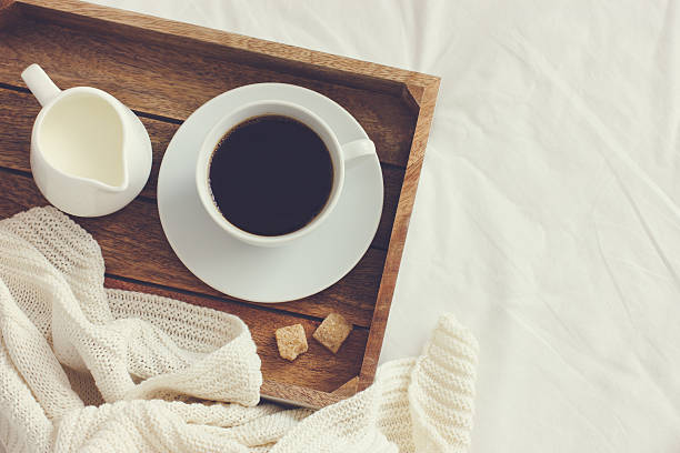 cup of coffee, cream and brown sugar on wooden tray cup of coffee, cream and brown sugar on wooden tray, toned,  top view, copy space wrap dress stock pictures, royalty-free photos & images