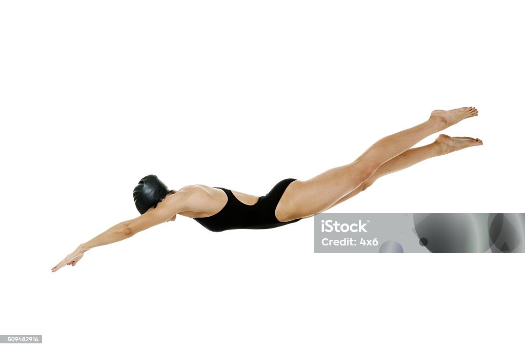 Female swimmer diving Female swimmer divinghttp://www.twodozendesign.info/i/1.png Diving Into Water Stock Photo
