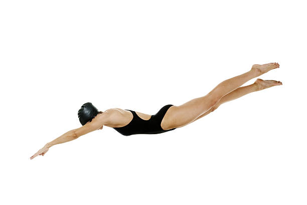 Female swimmer diving Female swimmer divinghttp://www.twodozendesign.info/i/1.png diving sport stock pictures, royalty-free photos & images