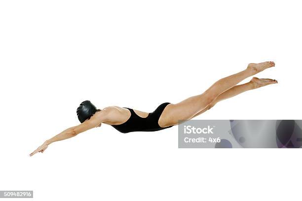 Female Swimmer Diving Stock Photo - Download Image Now - Diving Into Water, Swimming, White Background