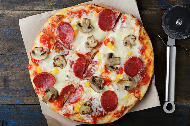 istock Sliced Pepperoni Pizza with mushrooms 509486228