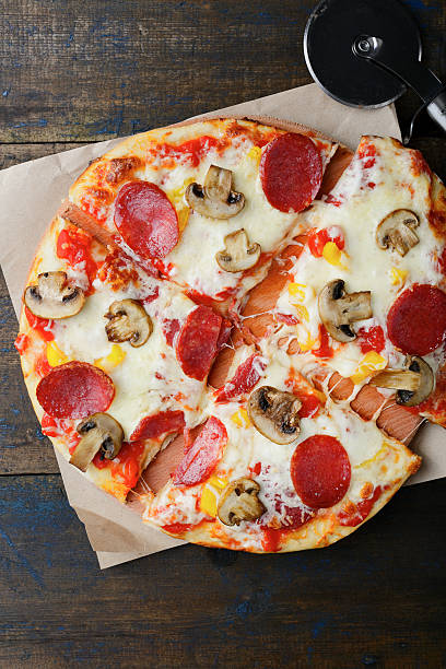 istock Pepperoni Pizza with cheese and mushrooms 509486404