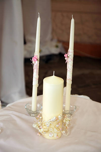 istock three white candles for the wedding ceremony 509486698