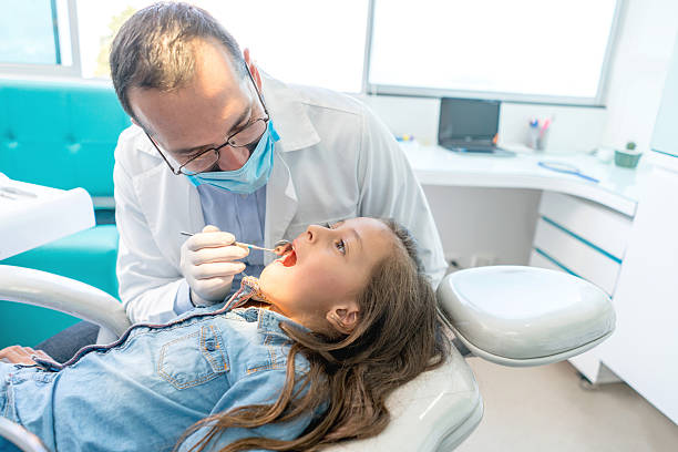 istock Girl smiling at the dentist 509487458