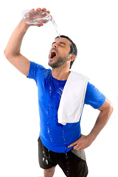 istock young handsome and athletic sport man drinking water 509487807