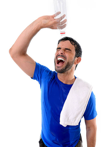 istock young handsome and athletic sport man drinking water 509487811