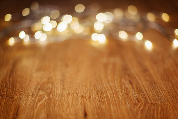 Wooden table with bokeh lights stock photo