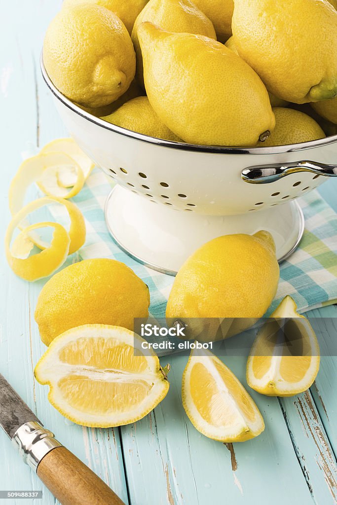 Fresh lemons. Fresh lemons in retro colander. Lemon - Fruit Stock Photo